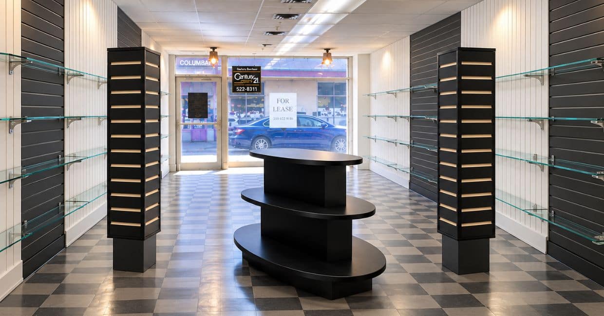 Modern retail store interior with installed wall fixtures and display shelving